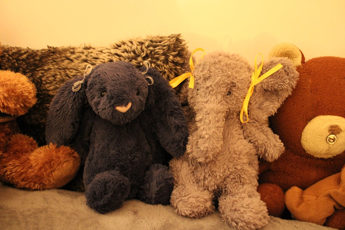 a group of stuffed animals sitting next to each other