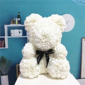 Blanche Witte Knuffelbeer Met Bloemaccenten En Fluwelige Vacht De Knuffel