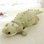 Groene Knuffel Krokodil Kussen Met Zwarte Vlekjes En Glimlach De Knuffel