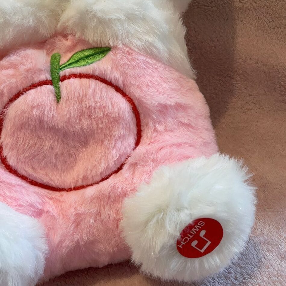 Hello Kitty Ademend Knuffel met Slaapliedje en Rustgevend Licht De Knuffel