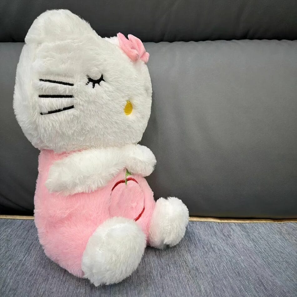 Hello Kitty Ademend Knuffel met Slaapliedje en Rustgevend Licht De Knuffel