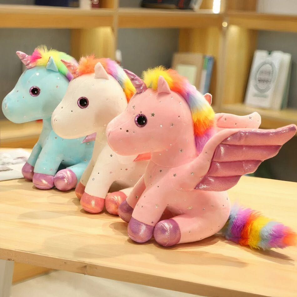 Knuffel Eenhoorn Met Glinsterende Vleugels En Regenboogmanen De Knuffel