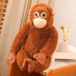Orang-Oetang Knuffel Met Klittenband Hangt Aan Tas Of Fiets De Knuffel