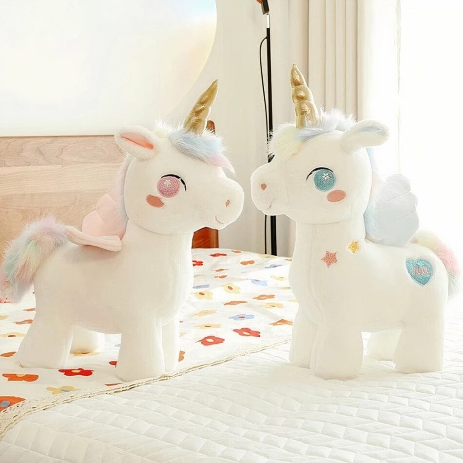 Schattige Eenhoornknuffel Met Gouden Hoorn En Regenboogvleugels De Knuffel