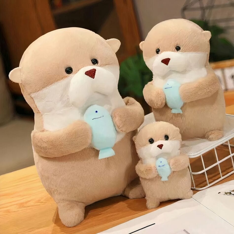 Zachte Otter Knuffel Met Blauwe Visje In Meerdere Maten De Knuffel