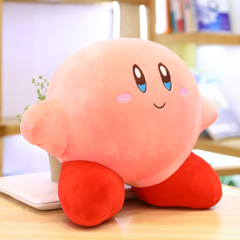 Zachte Roze Kirby Knuffel Met Rode Cape Glimlachende Mascotte De Knuffel